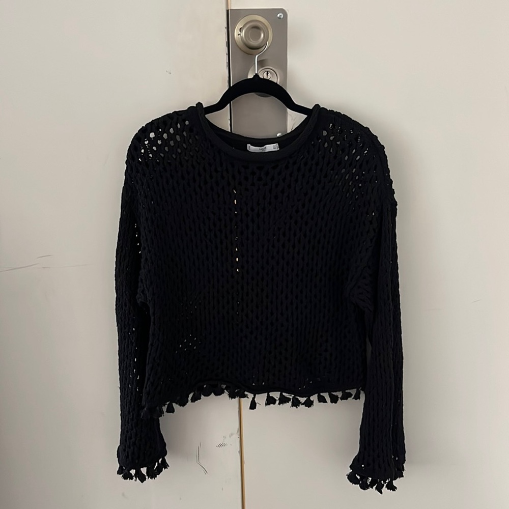 Black open knit sweater with tassels